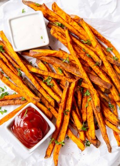 sweet potato fries served with ketchup and ranch dip