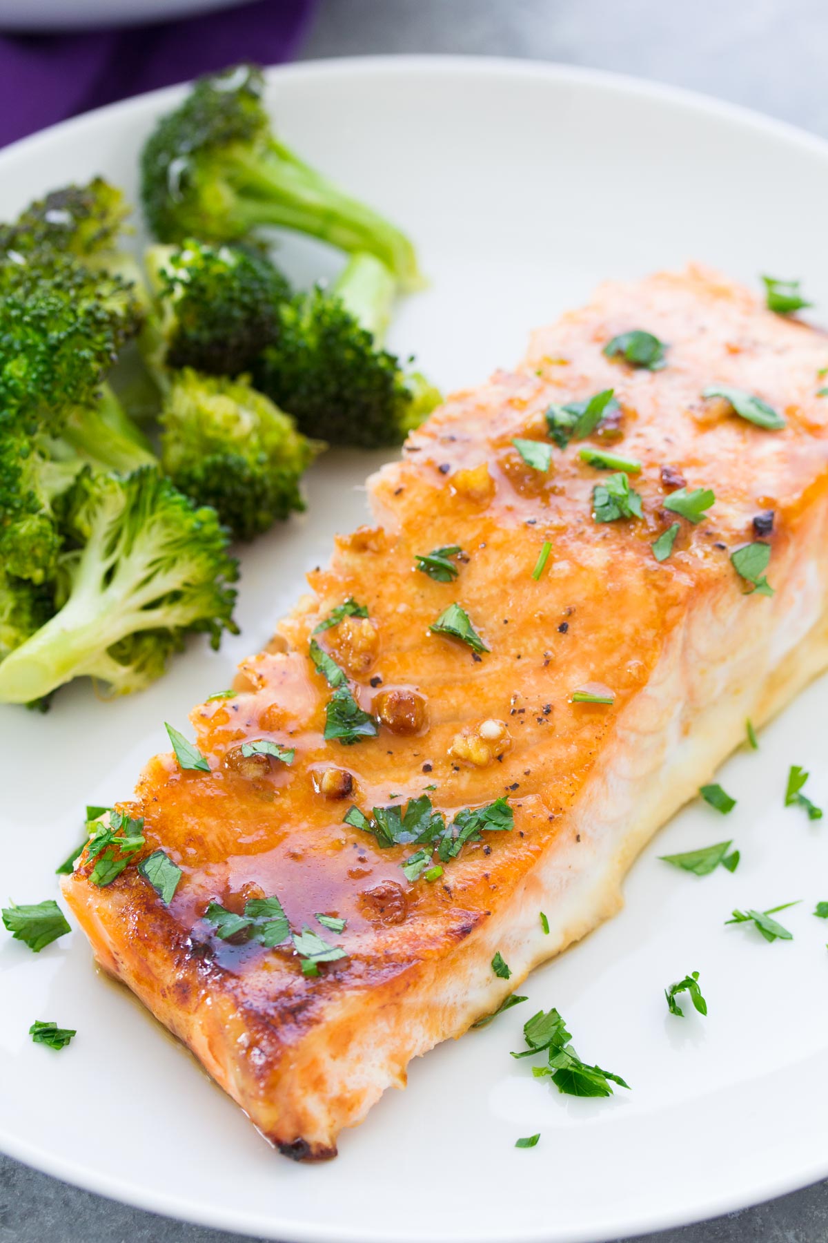 baked salmon served with broccoli