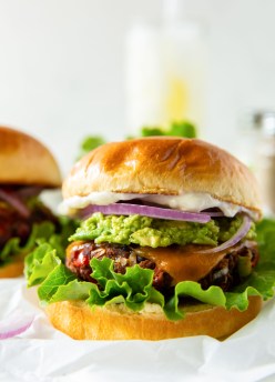 black bean burger with lettuce, cheese, red onion, guacamole and mayo