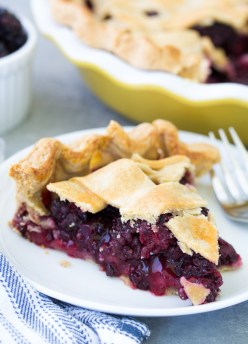 The best blackberry pie recipe using fresh blackberries or frozen blackberries! This blackberry pie filling is sweet and full of juicy berries! Use either my homemade flaky pie crust recipe or store bought pie crust in this easy fruit pie recipe this summer!