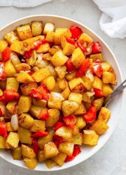 breakfast potatoes in a white serving bowl