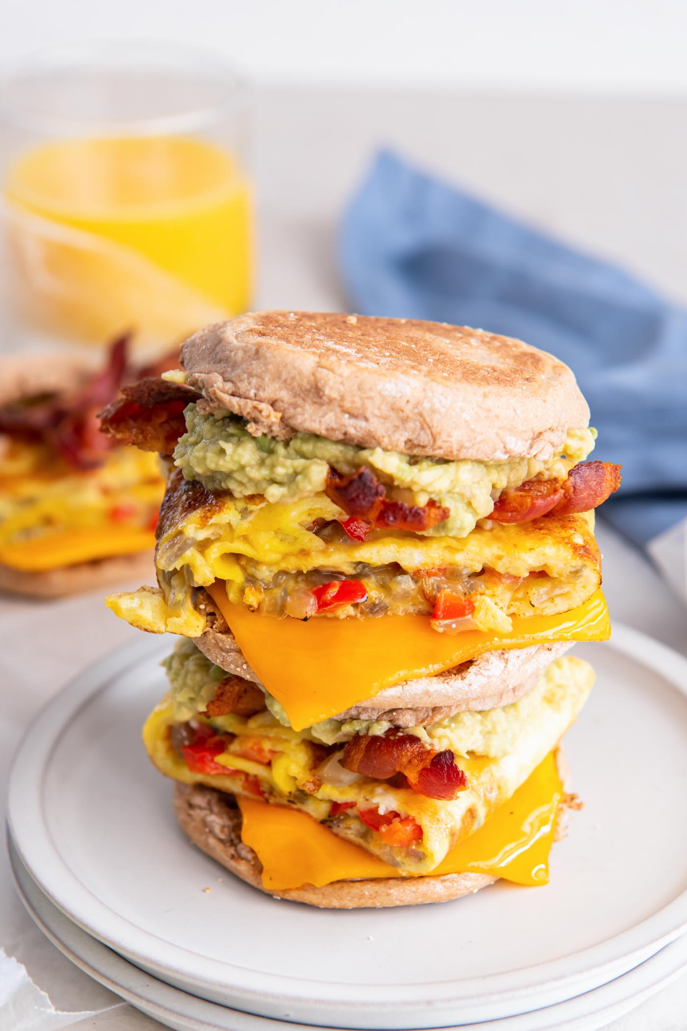 Two breakfast sandwiches stacked on top of each other.