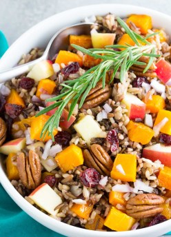 An easy, delicious holiday side dish or make ahead lunch. You will make this Roasted Butternut Squash Wild Rice Salad with Apple, Cranberries and apple cider dressing again and again! | www.kristineskitchenblog.com