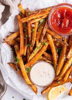 Cajun fries served with ketchup and ranch dip.