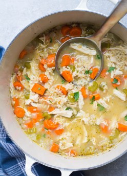 Homemade chicken and rice soup in a pot.