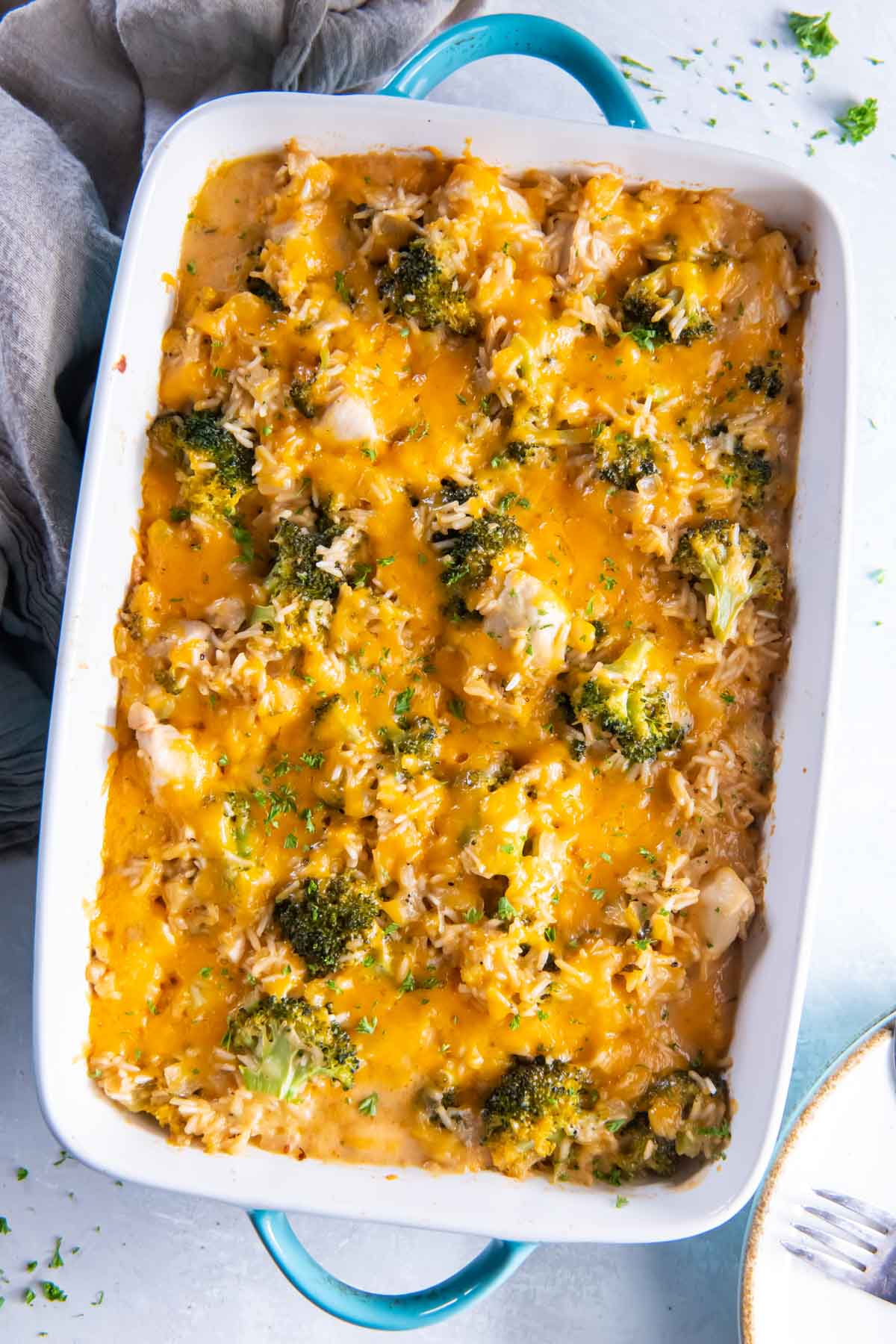 Baked chicken broccoli rice casserole in baking dish.