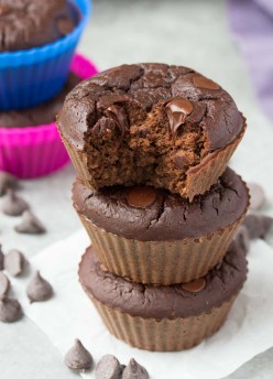 Chocolate Black Bean Blender Muffins, three muffins stacked on top of each other.