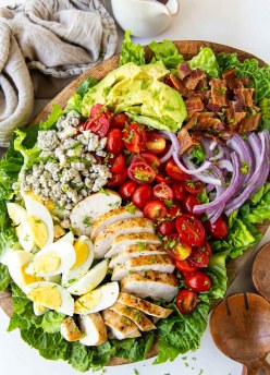 Cobb salad arranged on a large salad platter.