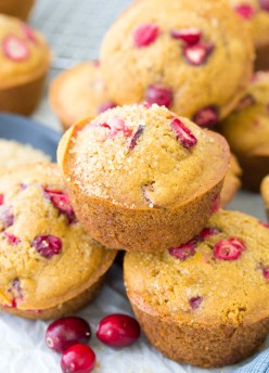 cranberry orange muffins stacked together