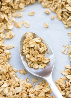 This simple homemade granola is deliciously crunchy! We make this 4-Ingredient Easy Granola Recipe almost every week! | www.kristineskitchenblog.com