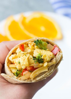 Healthy Freezer Vegetable Breakfast Burritos that you can make ahead and freeze for busy mornings. Easy meal prep burritos with broccoli, eggs and salsa! | www.kristineskitchenblog.com