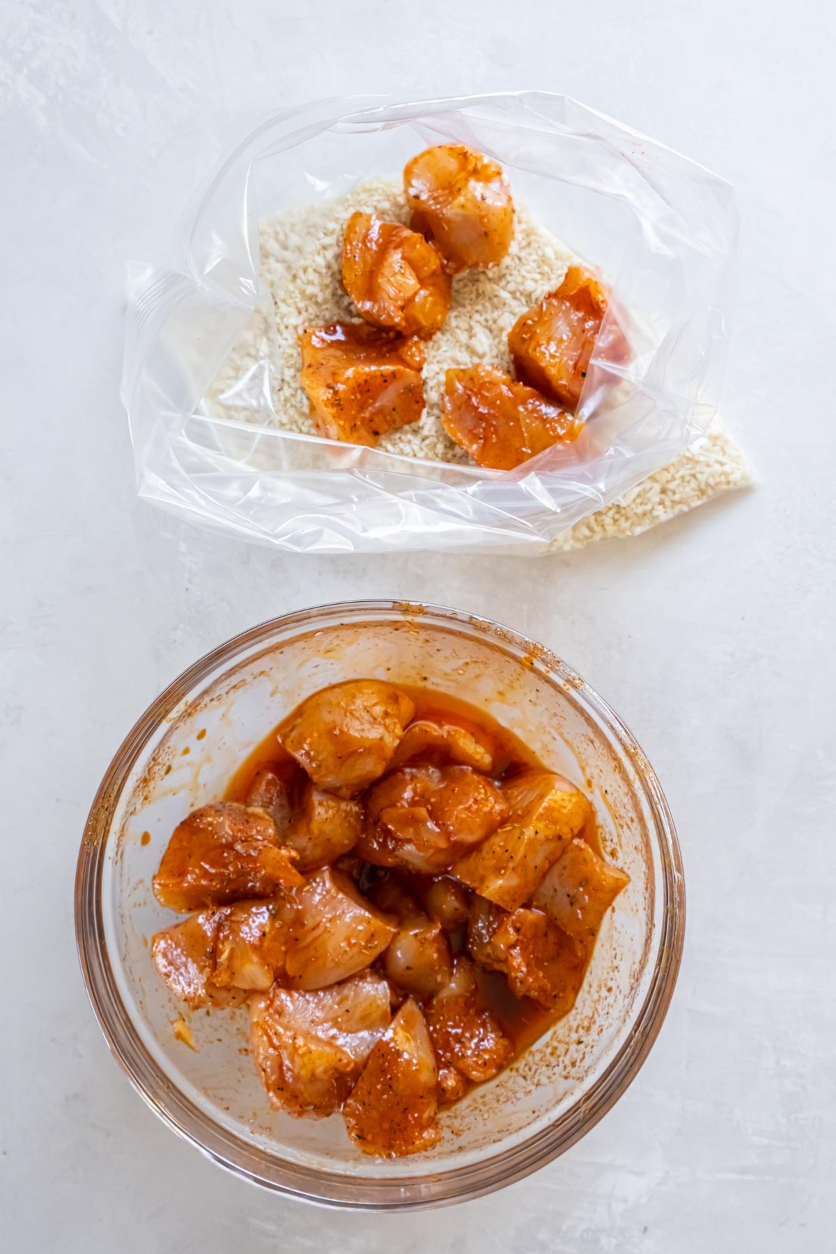 Chicken pieces added to zip-top bag with panko bread crumbs.