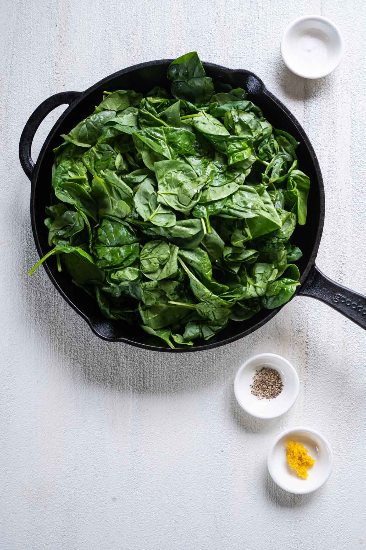 Fresh baby spinach added to skillet.