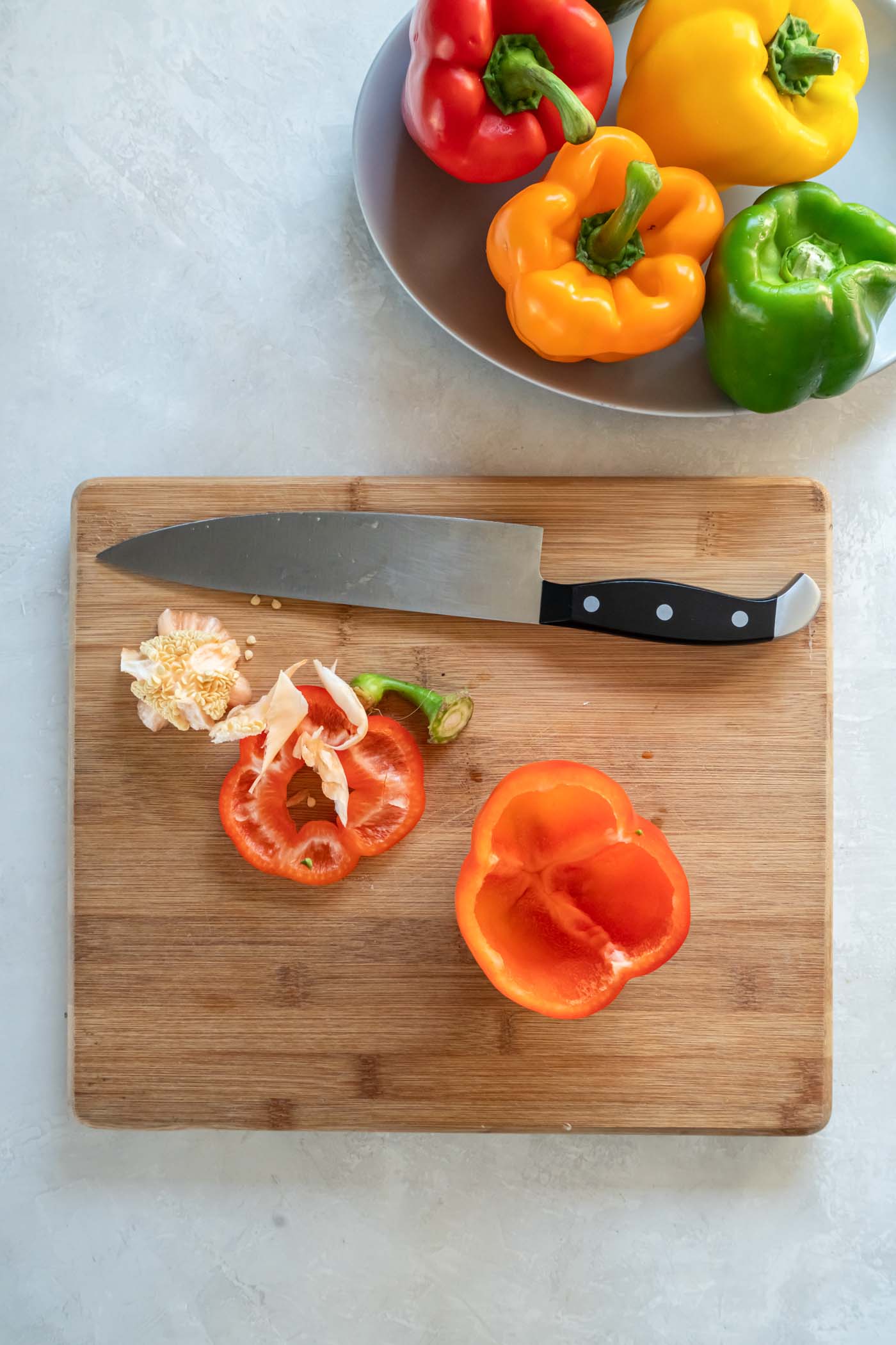 Bell pepper with top cut off and ribs and seeds removed.