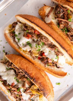 Italian beef served on toasted hoagie rolls with provolone cheese.