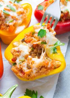 These cheesy Italian Quinoa Stuffed Peppers take stuffed peppers to a whole new level! They’re a healthy, protein-packed vegetarian meal! | www.kristineskitchenblog.com
