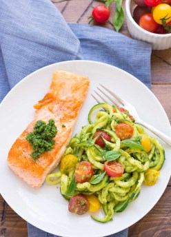 This simple and healthy Kale Pesto Zucchini Noodles and Salmon dinner is ready in just 30 minutes! This zoodles recipe is one of our favorites! kristineskitchenblog.com