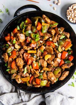 Kung Pao Chicken in a cast iron skillet.