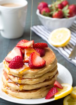 Fluffy Lemon Greek Yogurt Pancakes with maple syrup. A healthy pancake recipe that is easy to make.