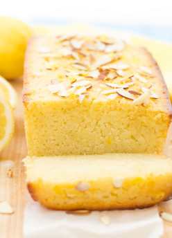 lemon pound cake on cutting board with 1 slice