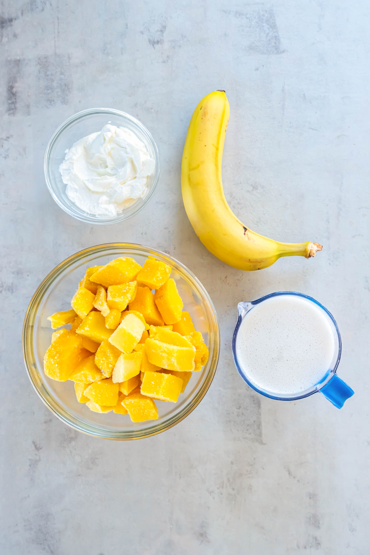 Ingredients for mango smoothie recipe.