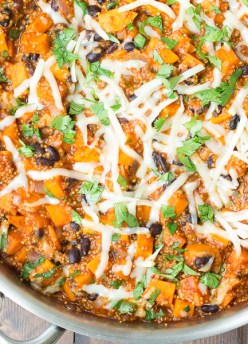 This Easy Skillet Mexican Quinoa with Sweet Potatoes is a one pot meal that you can have on your table in 30 minutes! Black beans add even more protein to this vegetarian dinner.