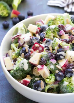 Broccoli salad with apple and blueberries and a creamy homemade dressing.