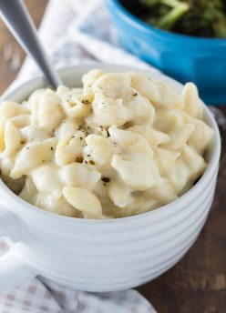 mac and cheese in a bowl with spoon