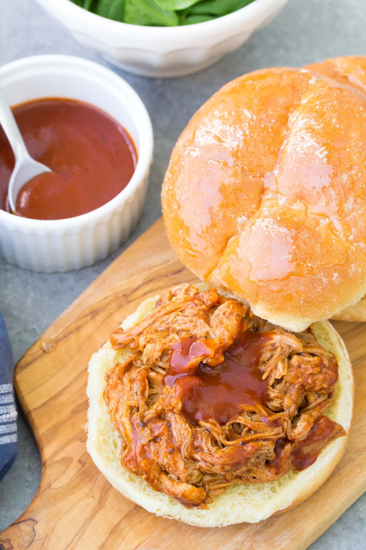 Slow cooker bbq pulled pork on a burger bun.