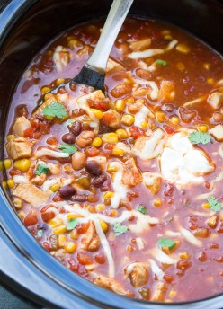 Dump and go (no chopping) easy slow cooker chicken taco soup recipe. A family favorite, made in your crock pot! | www.kristineskitchenblog.com