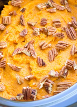Save oven space with this Healthy Slow Cooker Sweet Potato Casserole! A secret ingredient naturally sweetens this crock pot side dish!
