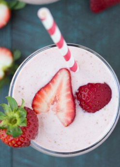 This Strawberry Milkshake Smoothie tastes just like a strawberry milkshake, but it's healthy! Protein-packed Greek yogurt makes it super creamy!