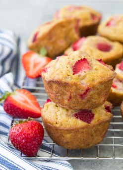 Make these healthy strawberry muffins to stock your freezer for quick breakfasts and snacks! This easy recipe can make strawberry banana muffins, strawberry applesauce muffins or strawberry yogurt muffins. Dairy-free and vegan options.