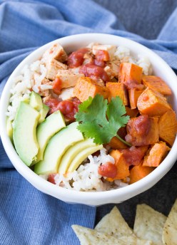 Easy Taco Chicken and Sweet Potato Burrito Bowls. Make these with leftover slow cooker taco chicken for a quick lunch or dinner! | www.kristineskitchenblog.com