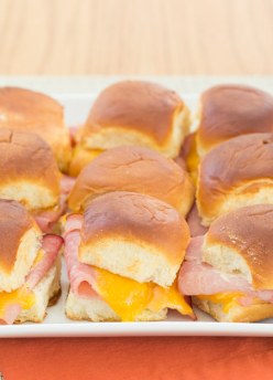 ham and cheese sliders on a serving tray