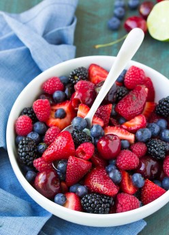 Everyone loves this easy and healthy recipe for Very Berry Fruit Salad with light honey lime dressing! A yummy summer side dish! kristineskitchenblog.com