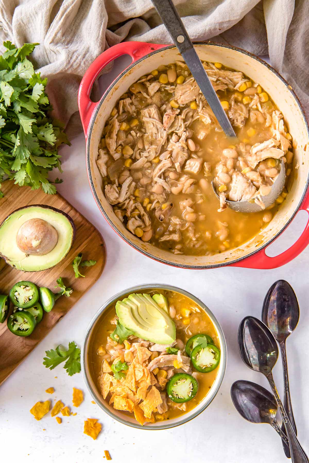 white chicken chili in a pot and bowl