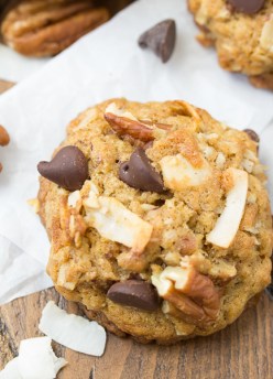 Soft and delicious Loaded Whole Wheat Chocolate Chip Cookies, made with wheat germ and 100% whole wheat flour! With toasted coconut, pecans, and oatmeal this healthier cookie recipe is the best!