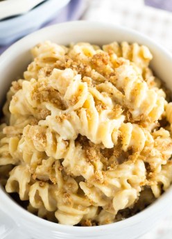 A creamy cheese sauce coats every bite of this healthier Whole Wheat Macaroni and Cheese! An easy weeknight meal that the whole family will love!
