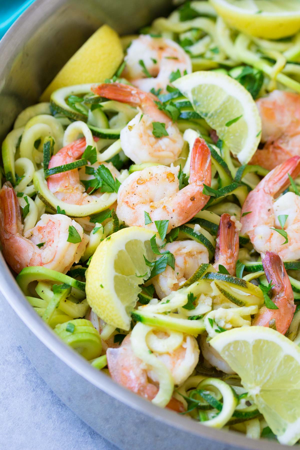 These Lemon Garlic Shrimp and Zucchini Noodles are a 20 minute meal that's gluten free and full of fresh flavors. This healthy dinner is made in one pot!